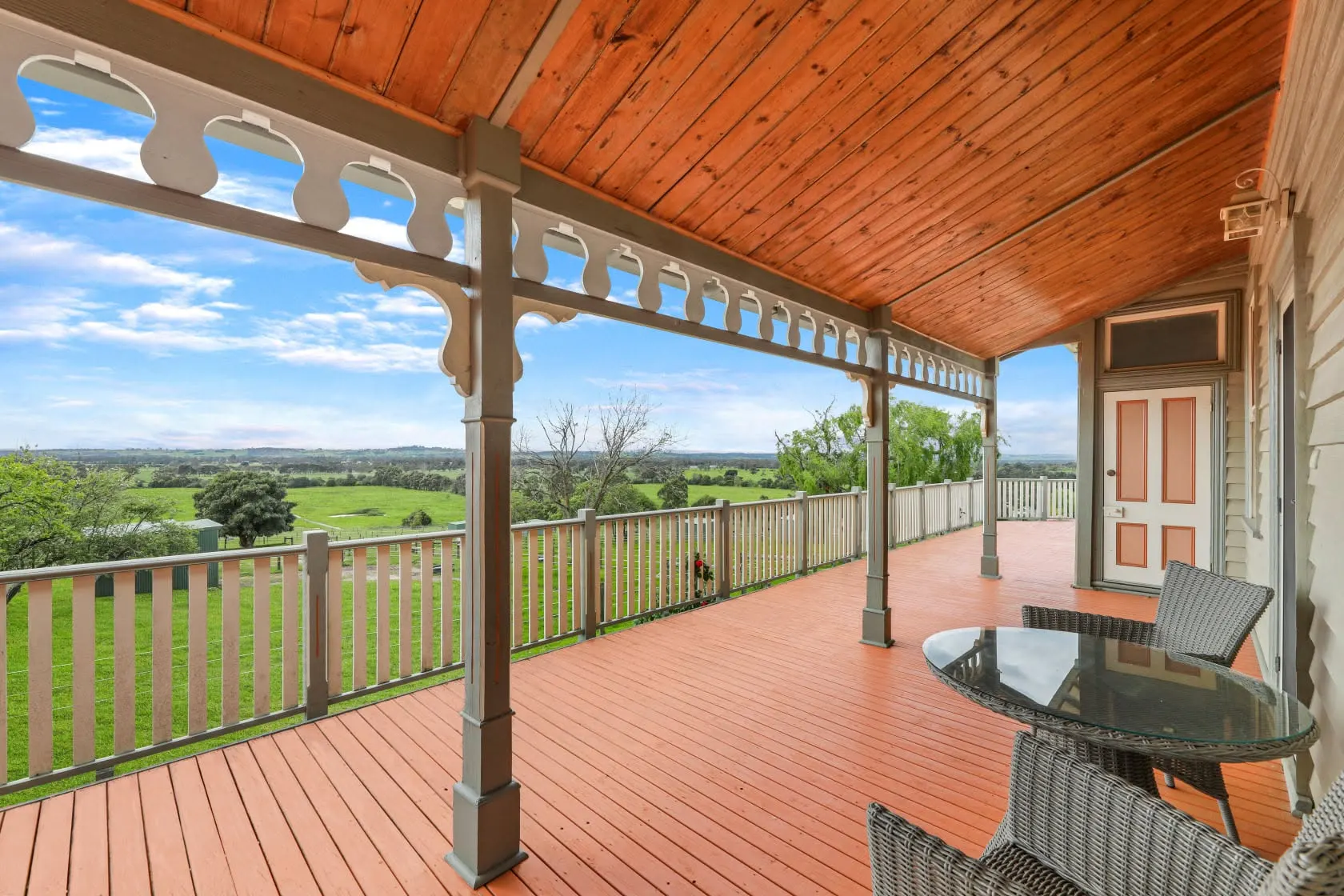 Wrap-around verandah at ProLodge Ballintrae overlooking the valley